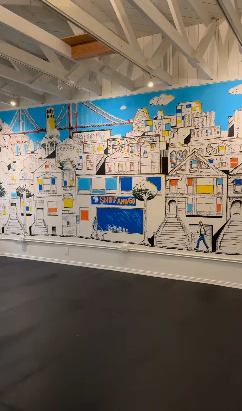 Inside the Sniff and Go training studio with mural at 2338 Market Street San Francisco